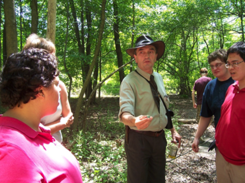 Dr. Stead conducting a field lesson with students