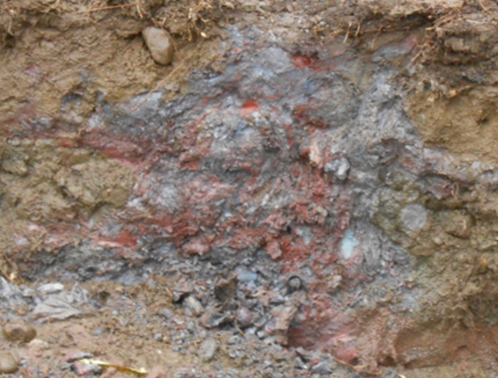 A buried continuous flow of toxic waste