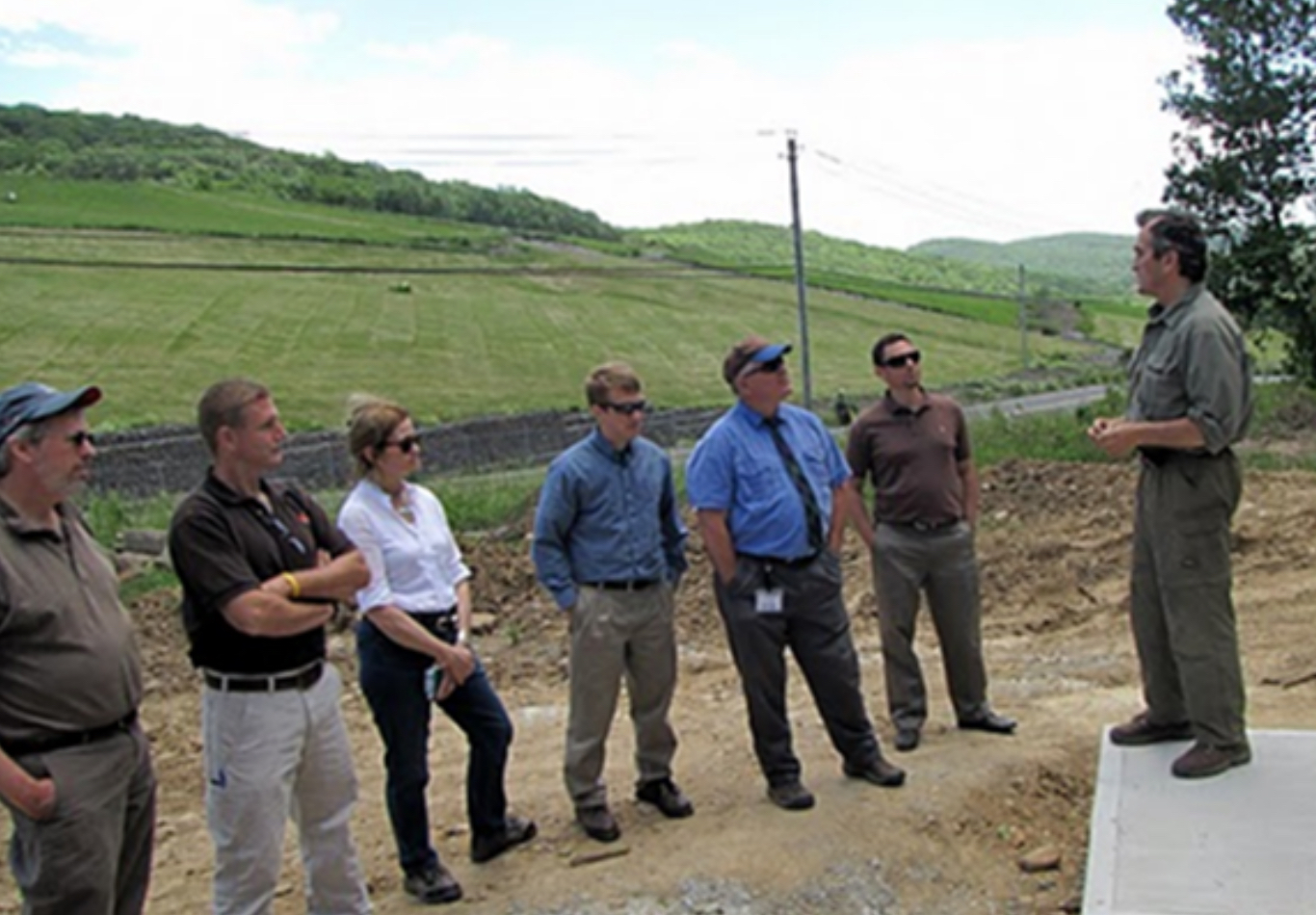Dr. Stead talking with Ford and DEC representatives
